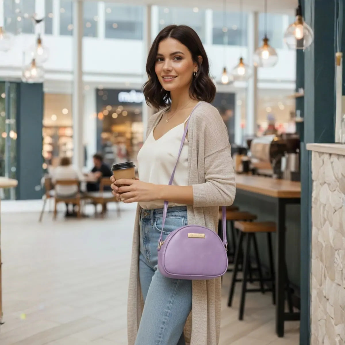 Women’s crossbody sling bag made from premium vegan leather with a sleek modern design