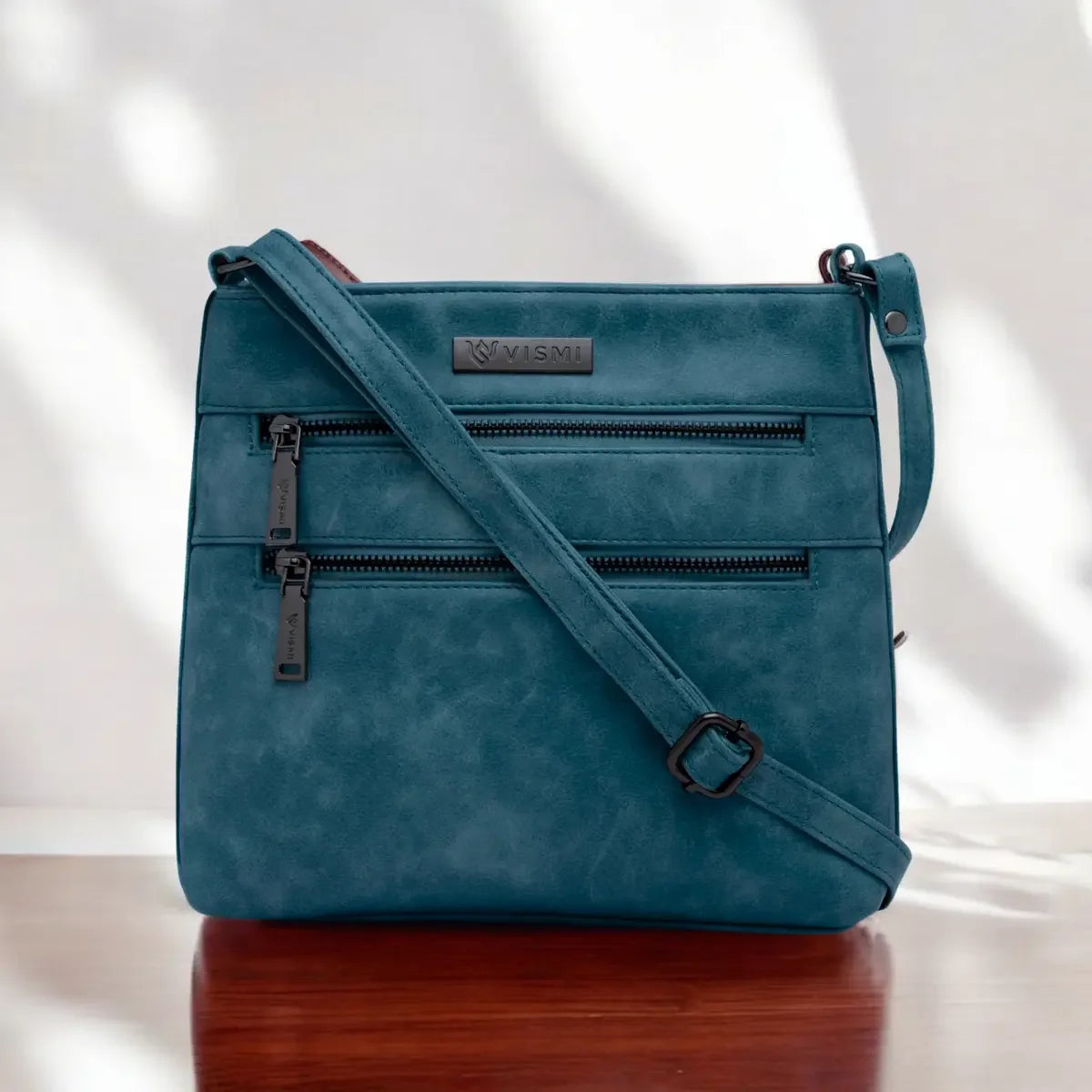 timeless-versa-women-sling-bag-teal-blue-front-view