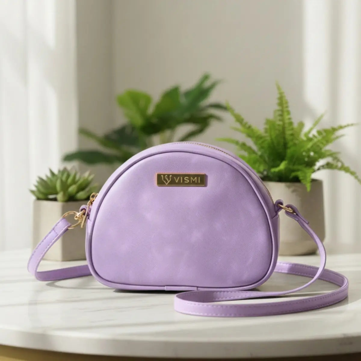 Women’s crossbody sling bag made from premium vegan leather with a sleek modern design