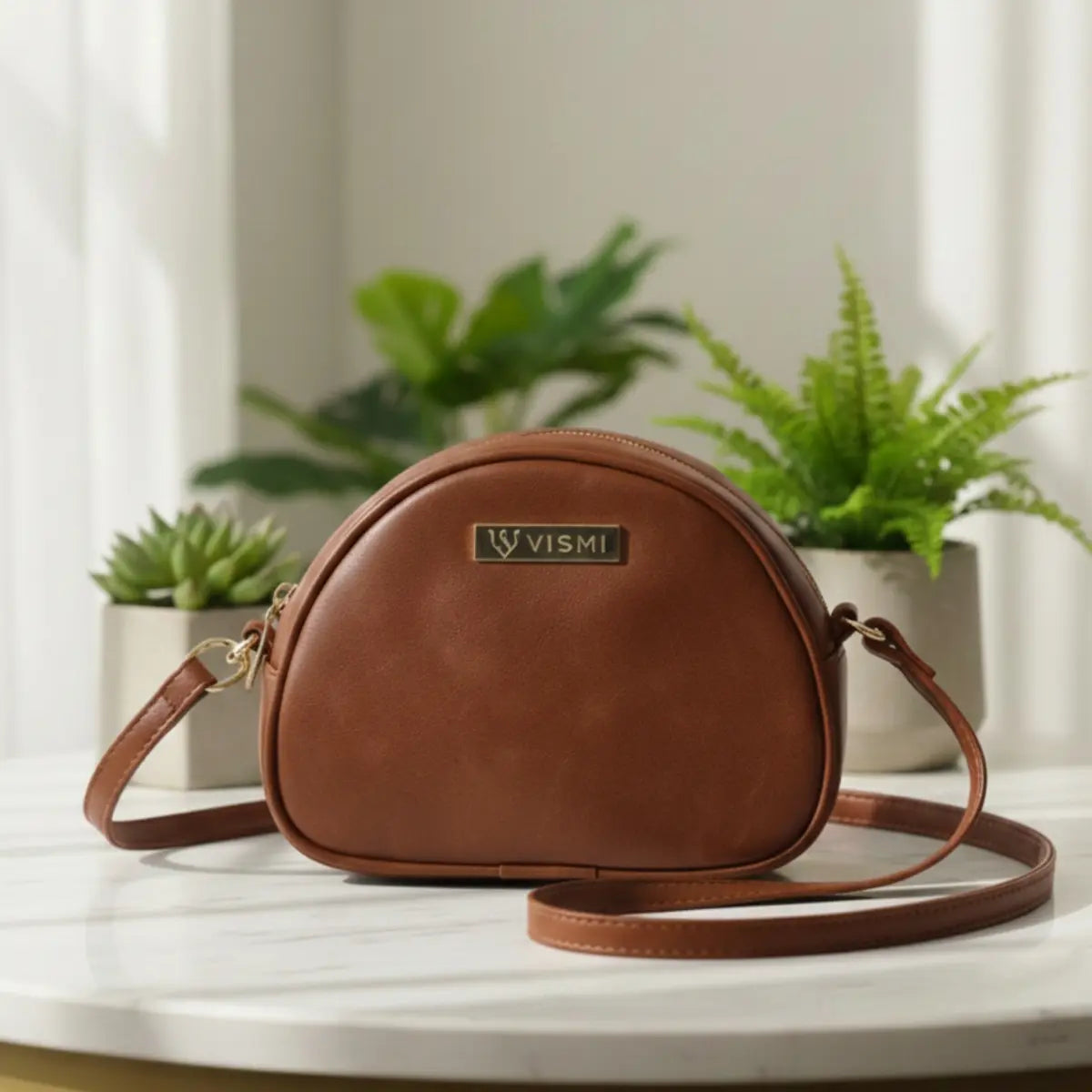 Women’s crossbody sling bag made from premium vegan leather with a sleek modern design.